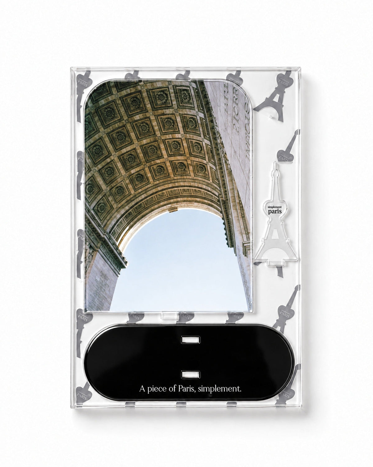 Flat-pack contents of Arc de Triomphe: printed acrylic panel, glossy black base and Eiffel Tower piece