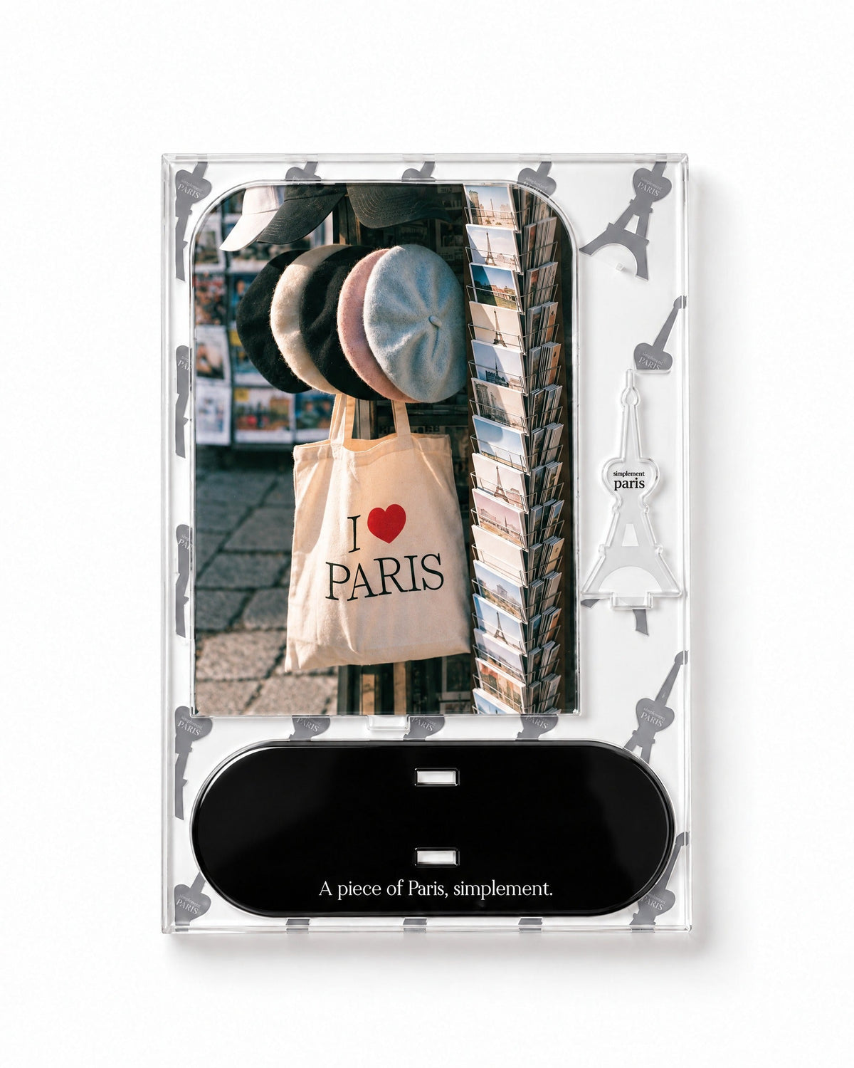 Flat-pack contents of Berets & Postcards: acrylic panel, glossy black base and Eiffel Tower piece