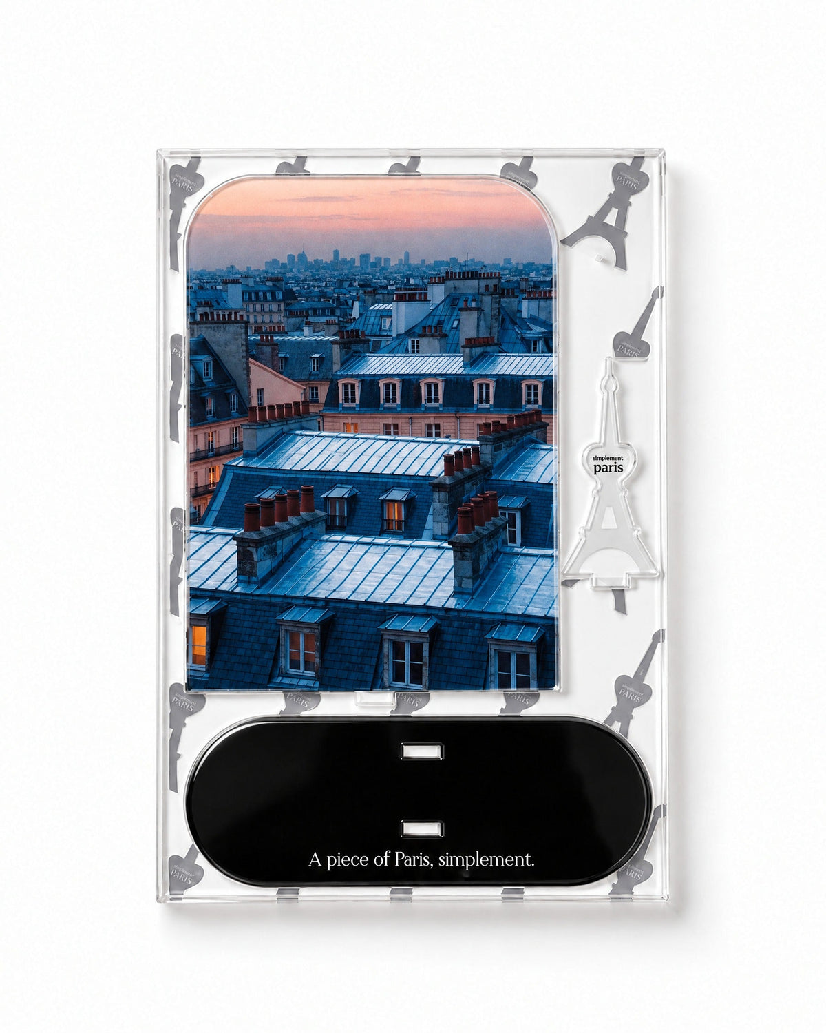 Flat-pack contents of Blue Hour Rooftops: printed acrylic panel, glossy black base and Eiffel Tower piece