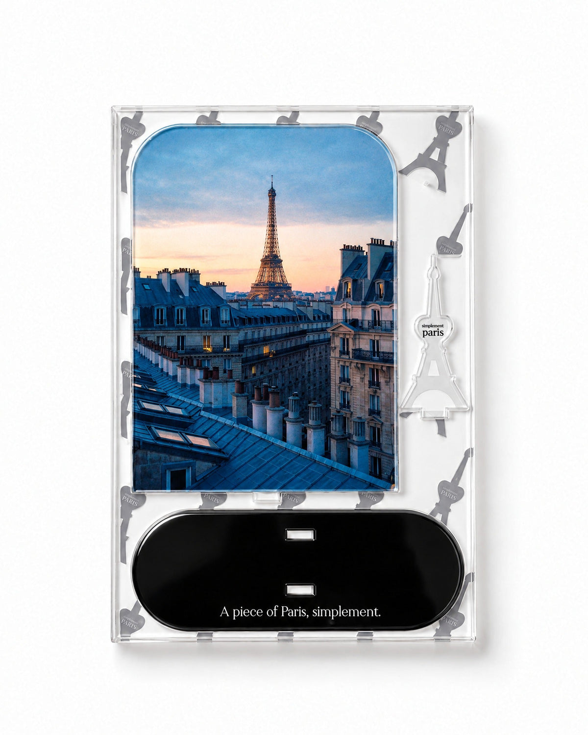 Flat-pack contents of Eiffel at Dusk: printed acrylic panel, glossy black base and Eiffel Tower piece
