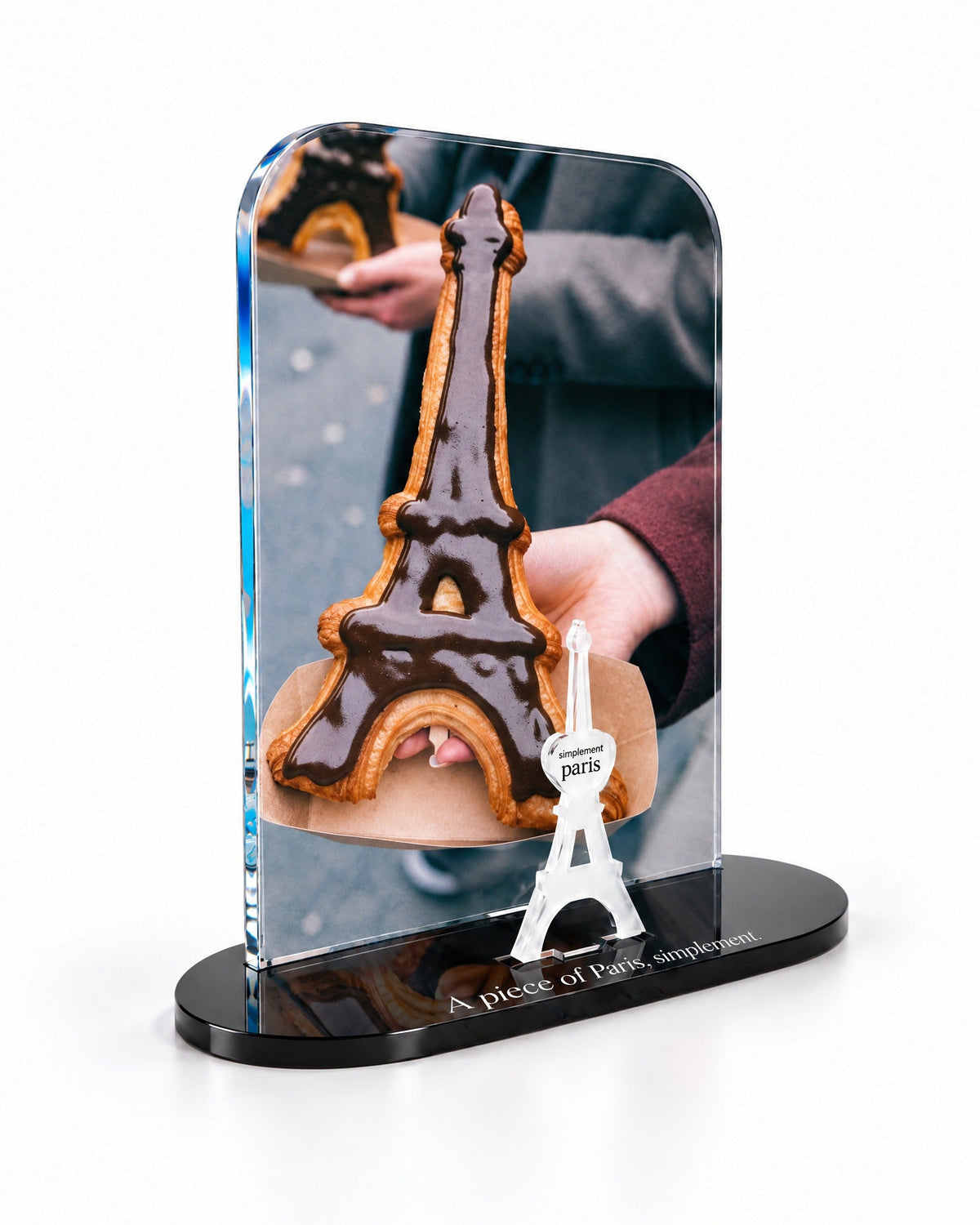 Three-quarter view of the Eiffel Croissant acrylic decor showing the thick glossy panel and separate Eiffel Tower