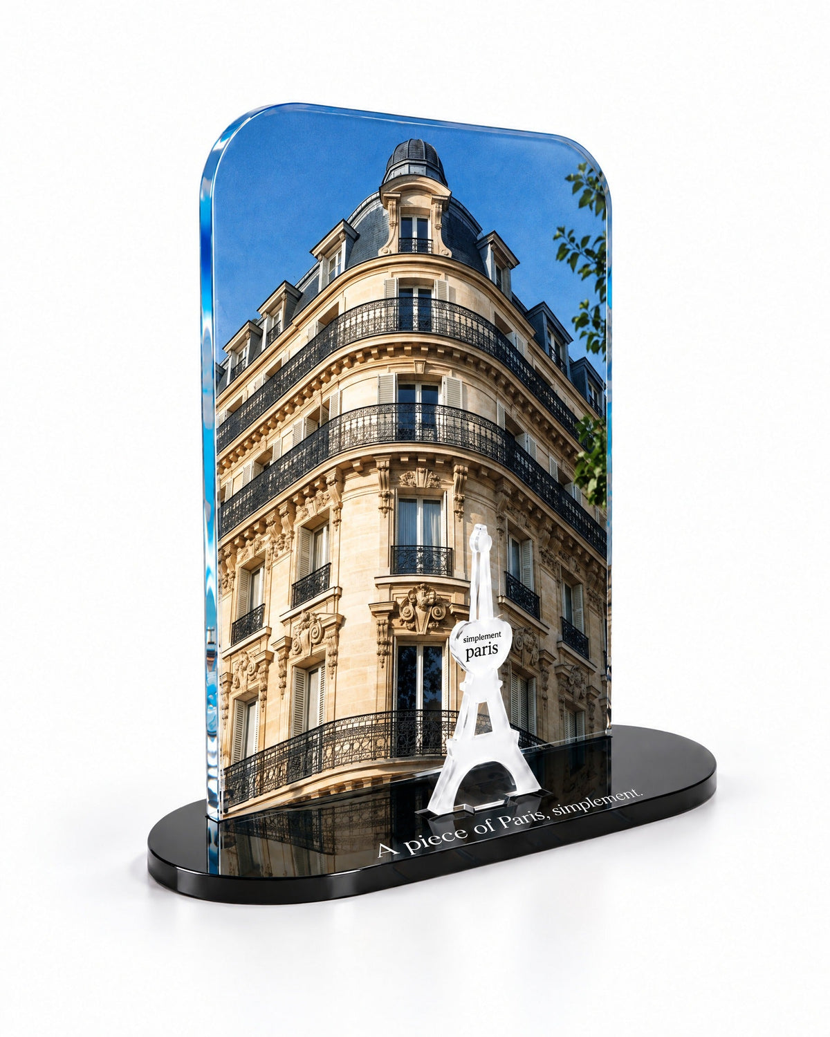 Three-quarter view of the Haussmann acrylic decor showing the thick glossy panel and separate Eiffel Tower