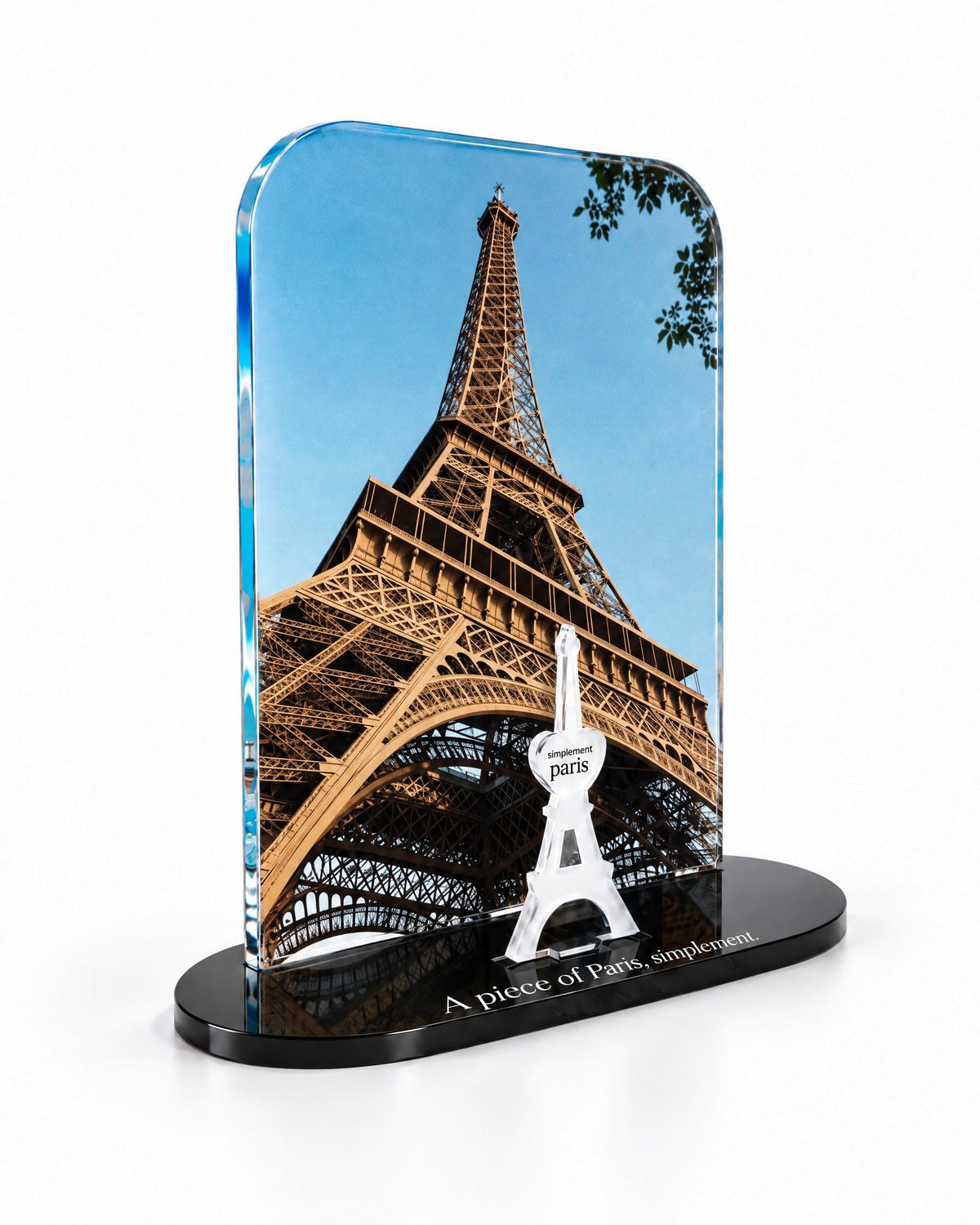 Three-quarter view of the La Tour Eiffel acrylic decor showing the thick glossy panel and separate Eiffel Tower