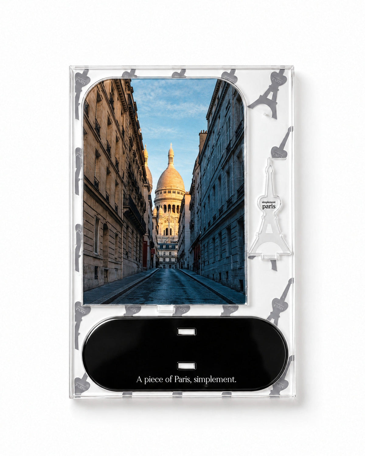 Flat-pack contents of Montmartre: acrylic panel, glossy black base and Eiffel Tower piece