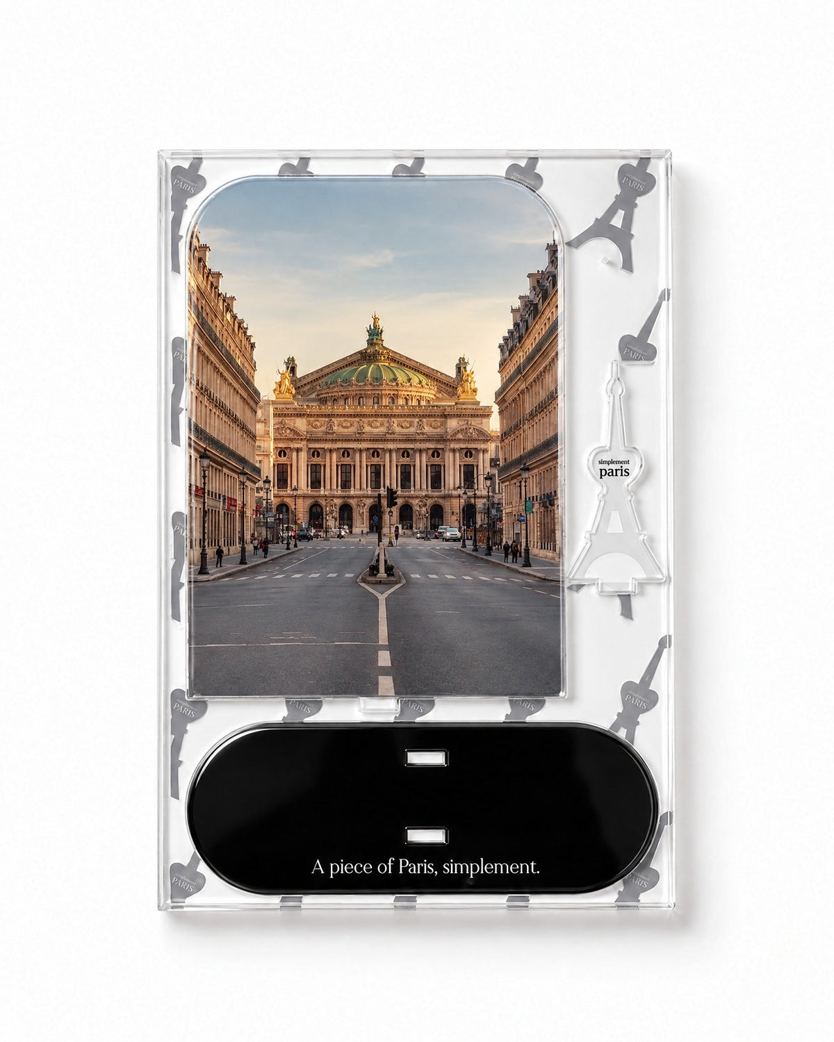 Flat-pack contents of Opéra Garnier: printed acrylic panel, glossy black base and Eiffel Tower piece
