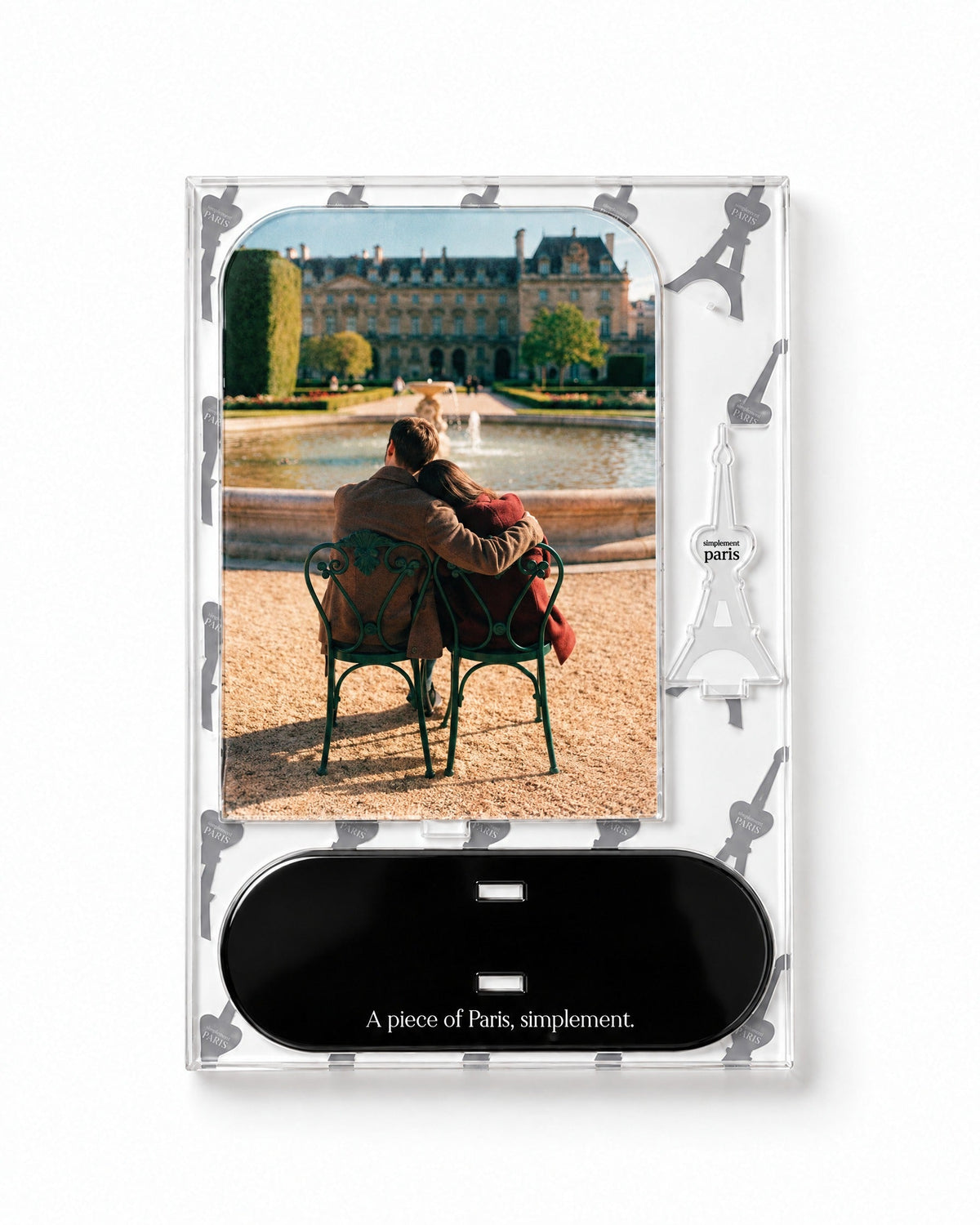 Flat-pack contents of Paris for Two: acrylic panel, glossy black base and Eiffel Tower piece