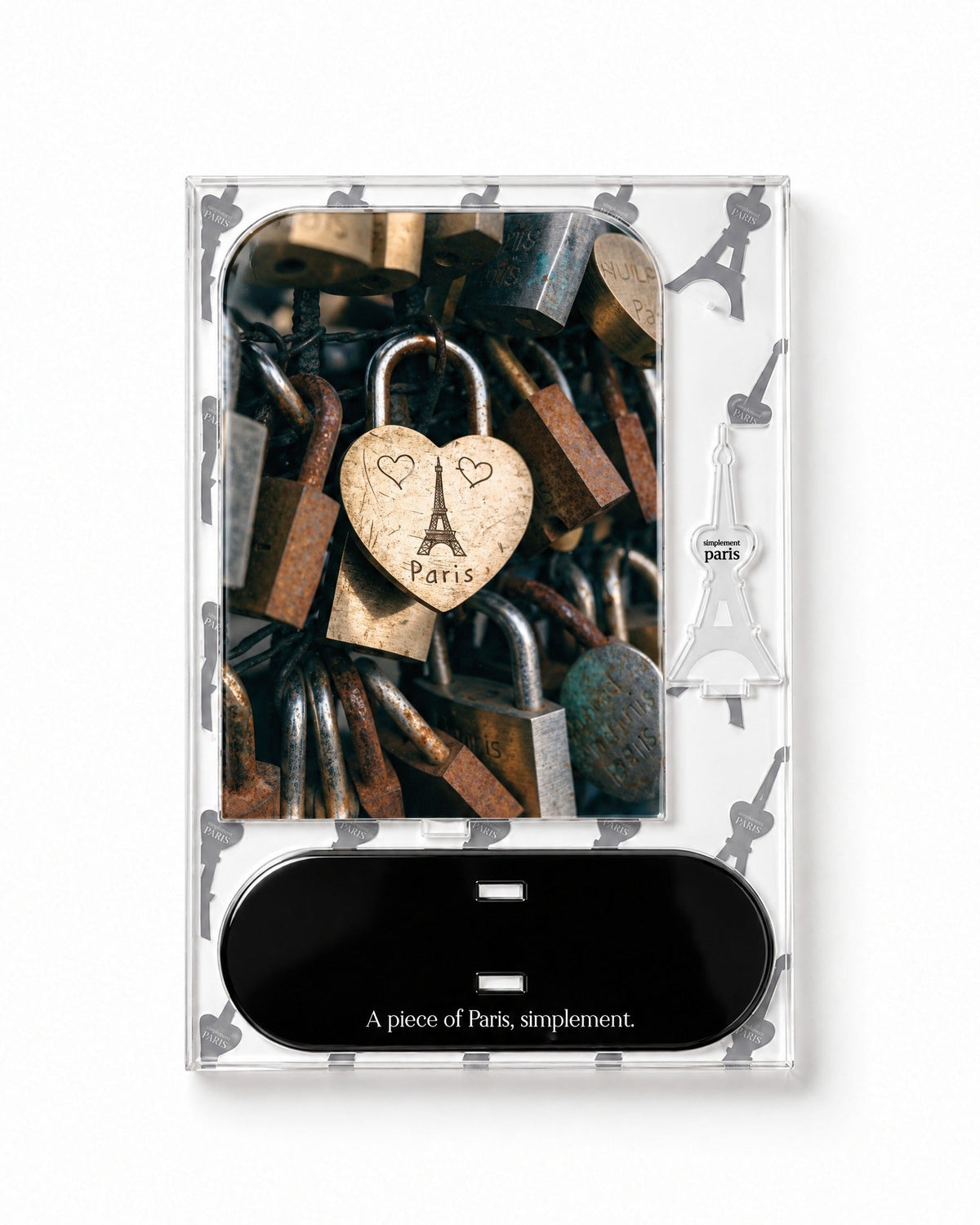 Flat-pack contents of Paris Love Lock: printed acrylic panel, glossy black base and Eiffel Tower piece