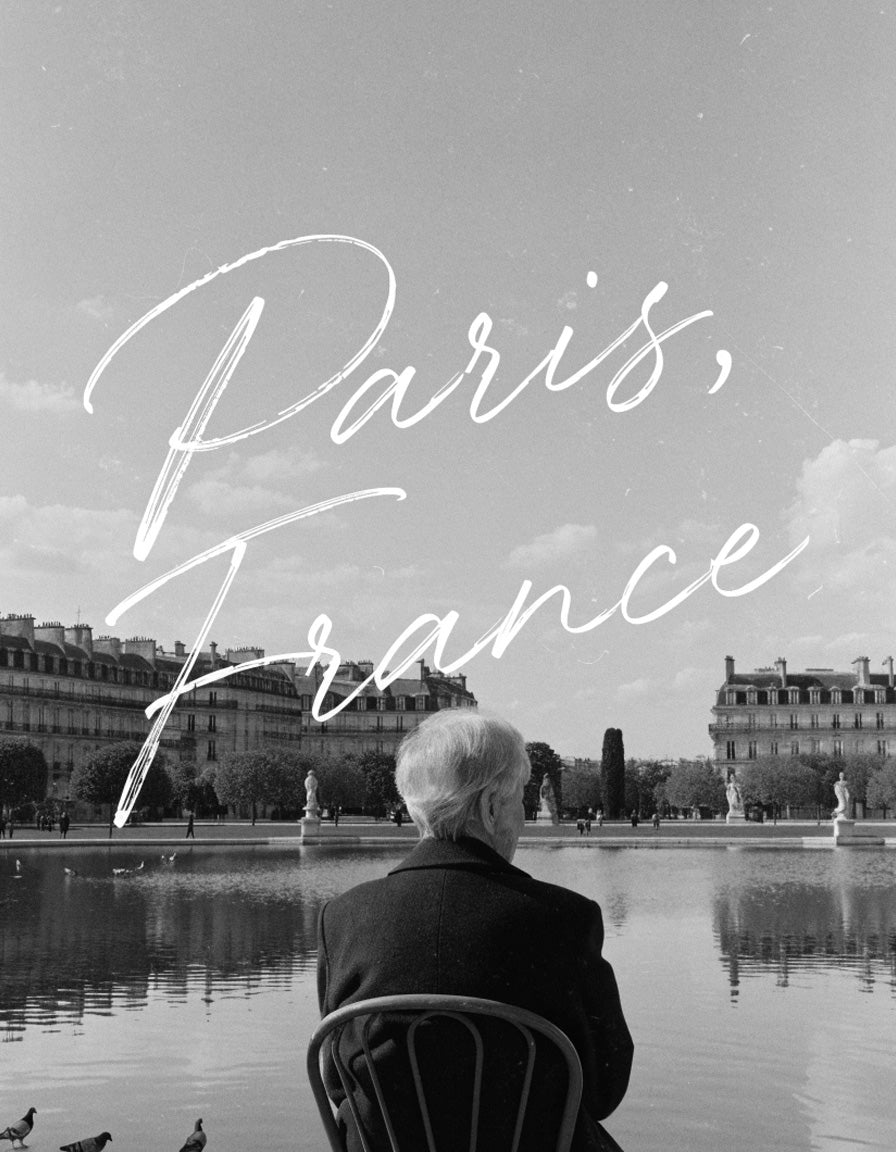 A quiet moment by the water in a Paris garden
